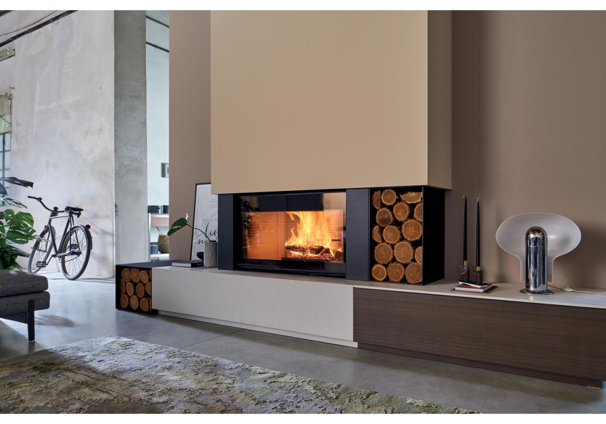 camino moderno con vano legna caminetti aliberti