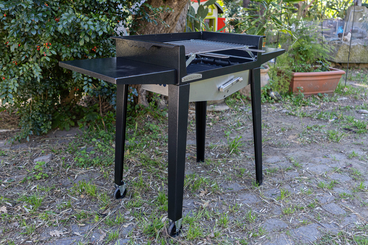 barbecue con griglia n acciaio inox regolabile