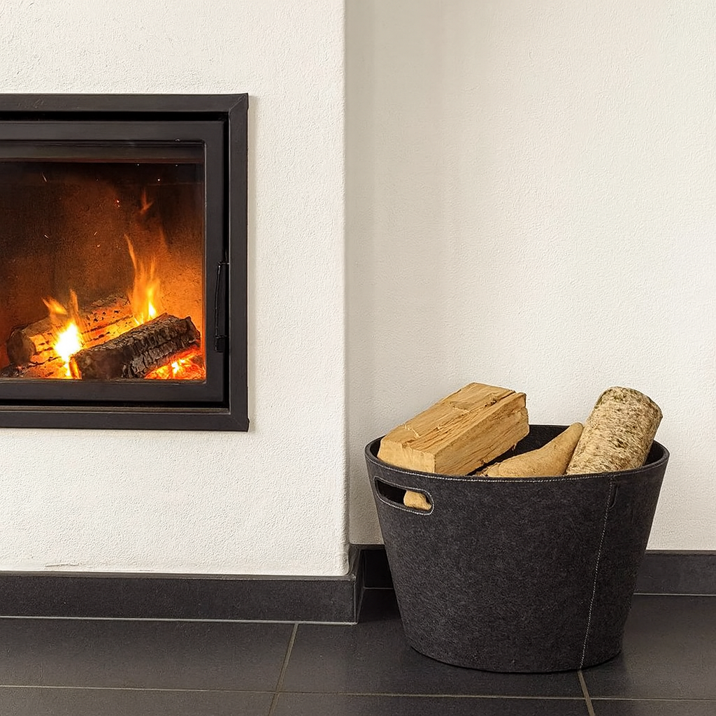 cesta tonda con manici per legna e riviste 